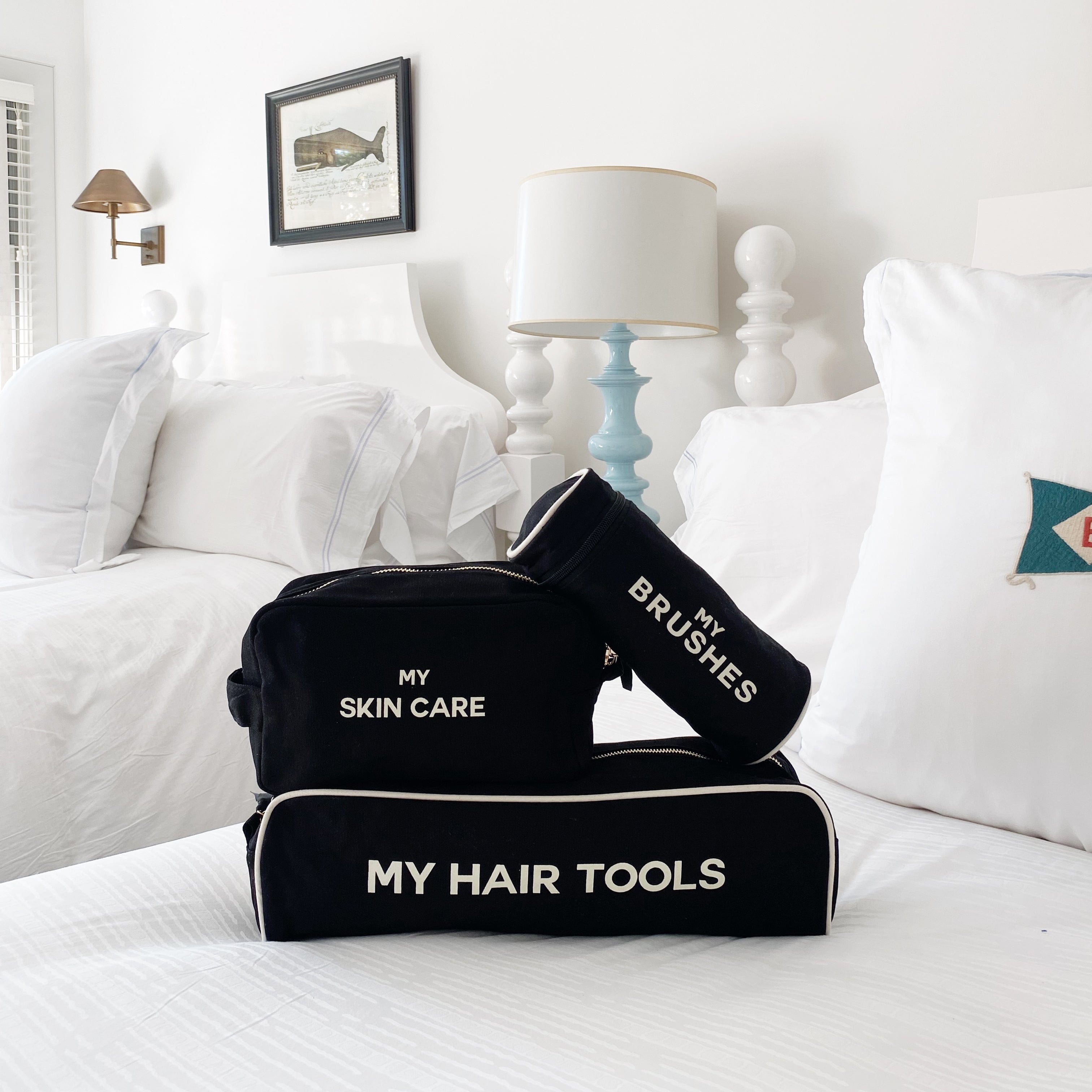 Bag-all Pamper Gift Set Deal 3-Pack Black featuring organized beauty storage with hair tools case, brushes case, and skincare pouch in sleek black cotton with white text labeling
