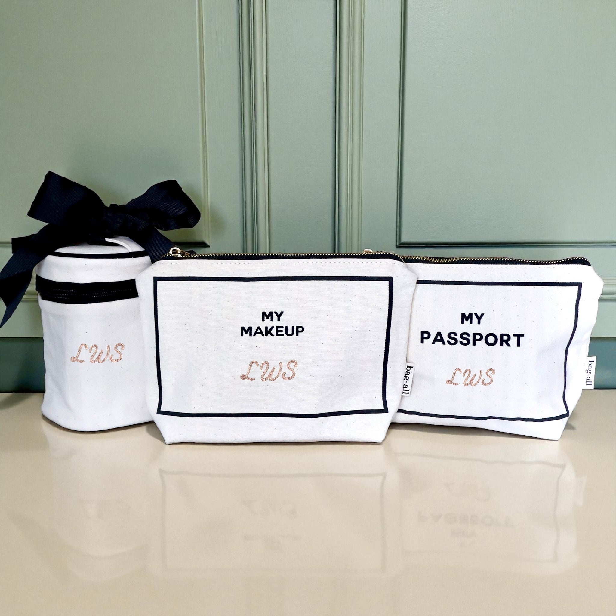 Bag-all Carry On Essentials Deal 3-pack organizer set with passport, liquid, and makeup bags in cream color