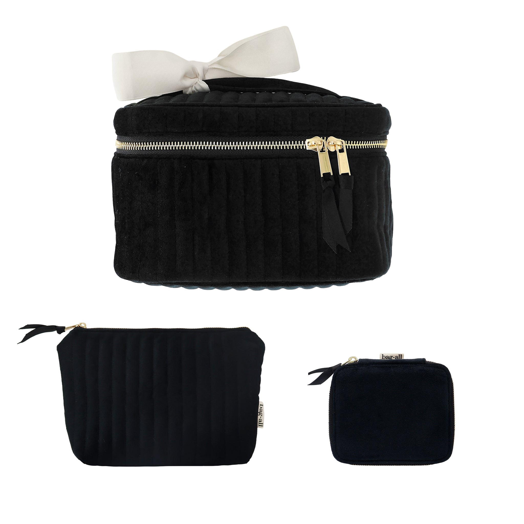 Black eco-velvet Bag-all Glow & Go 3-pack gift set with quilted makeup and jewelry pouches on white background