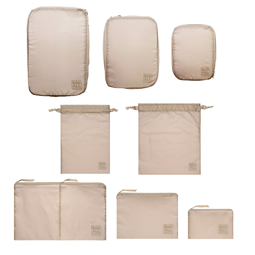 Bag-all Compression Cubes & Packing Bags Set in taupe featuring 8 eco-friendly organizers, including compression cubes, drawstring bags, and zip pouches for efficient travel packing