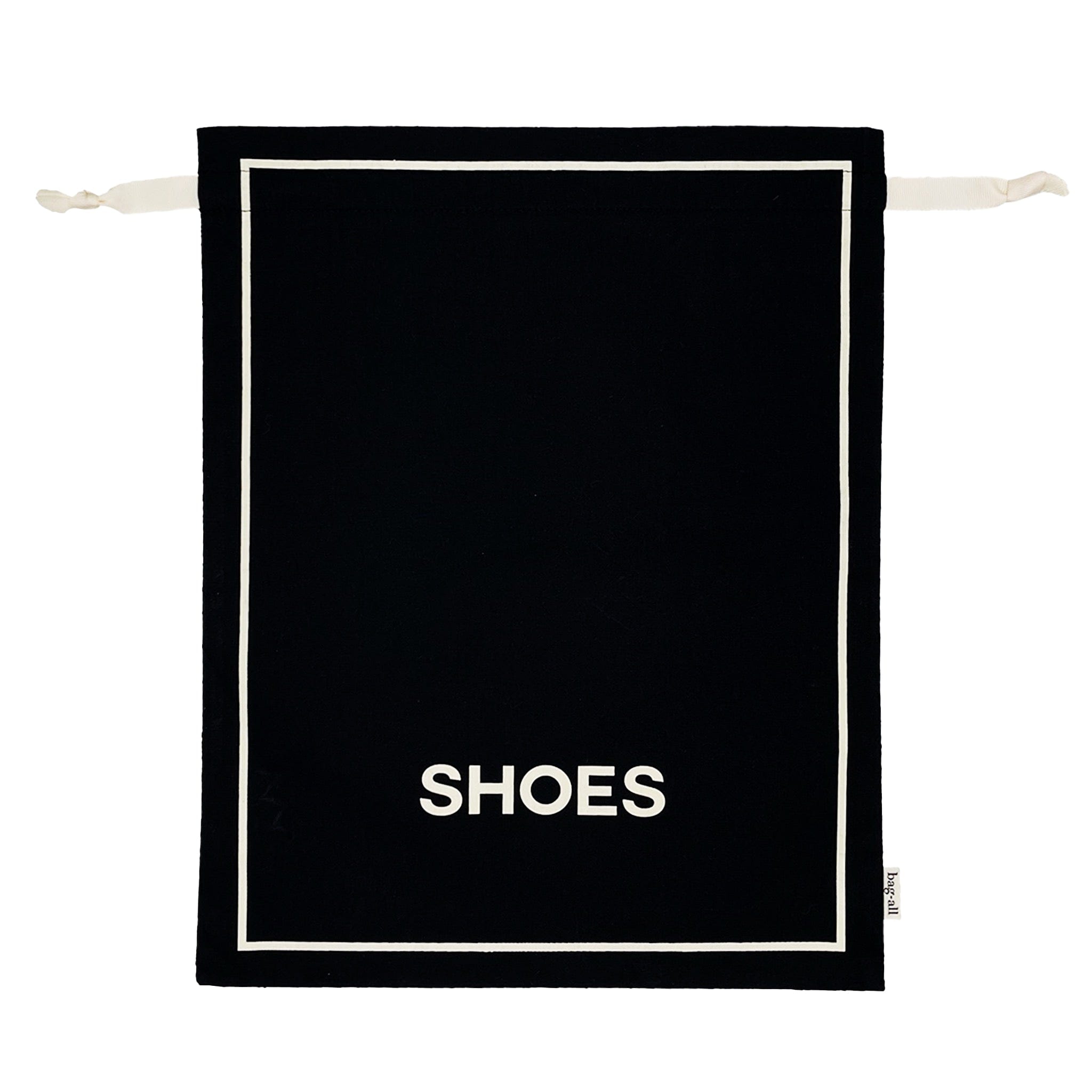 Bag-all Couture Shoe Travel Bag in black cotton with white border trim and SHOES text, featuring drawstring closure for elegant footwear storage and protection