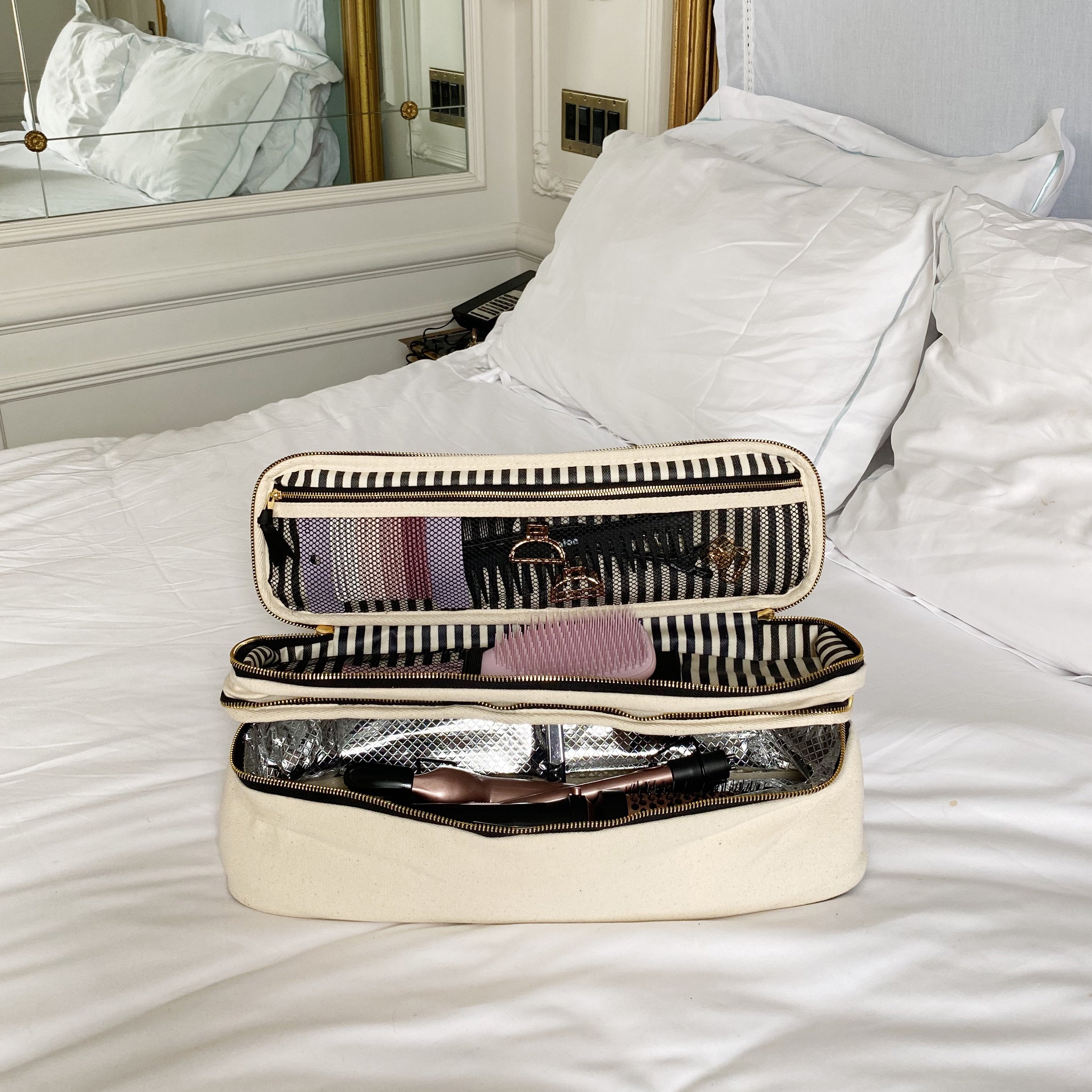 Bag-all Double Hair Tools Travel Case in cream with dual compartments, heat-protective lining, and storage bands for Dyson Airwrap and styling accessories