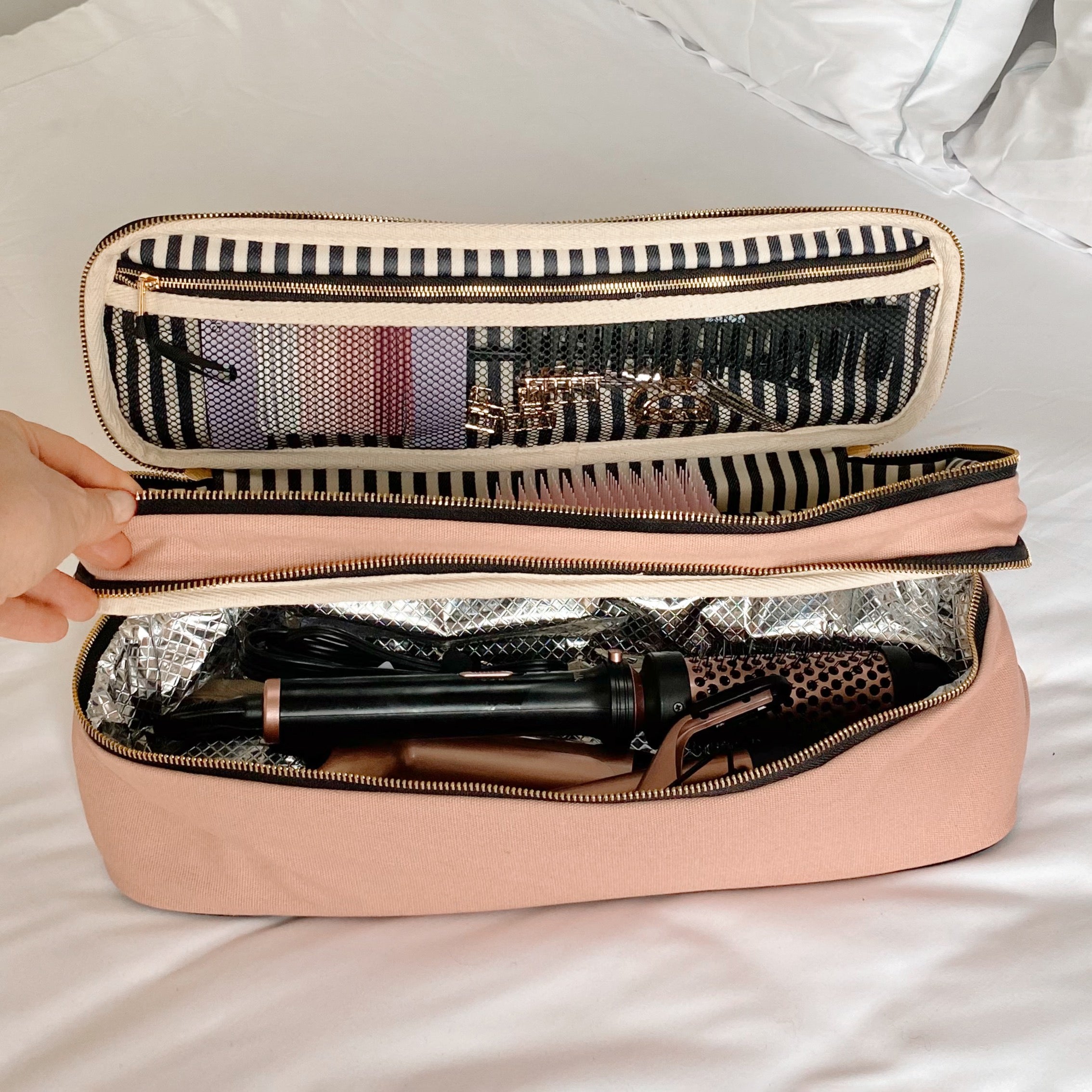 Bag-all Double Hair Tools Travel Case in Pink/Blush featuring dual compartments with heat-protective lining, striped interior, secure bands, and mesh storage pocket for styling accessories