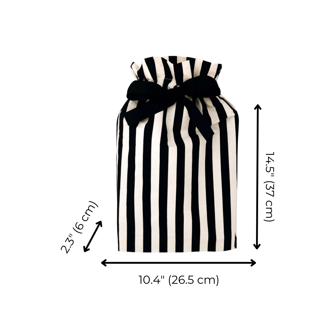 Bag-all Gift Bag Striped Medium - Reusable black and white vertical striped cotton gift bag with black bow closure, featuring elegant design and eco-friendly construction