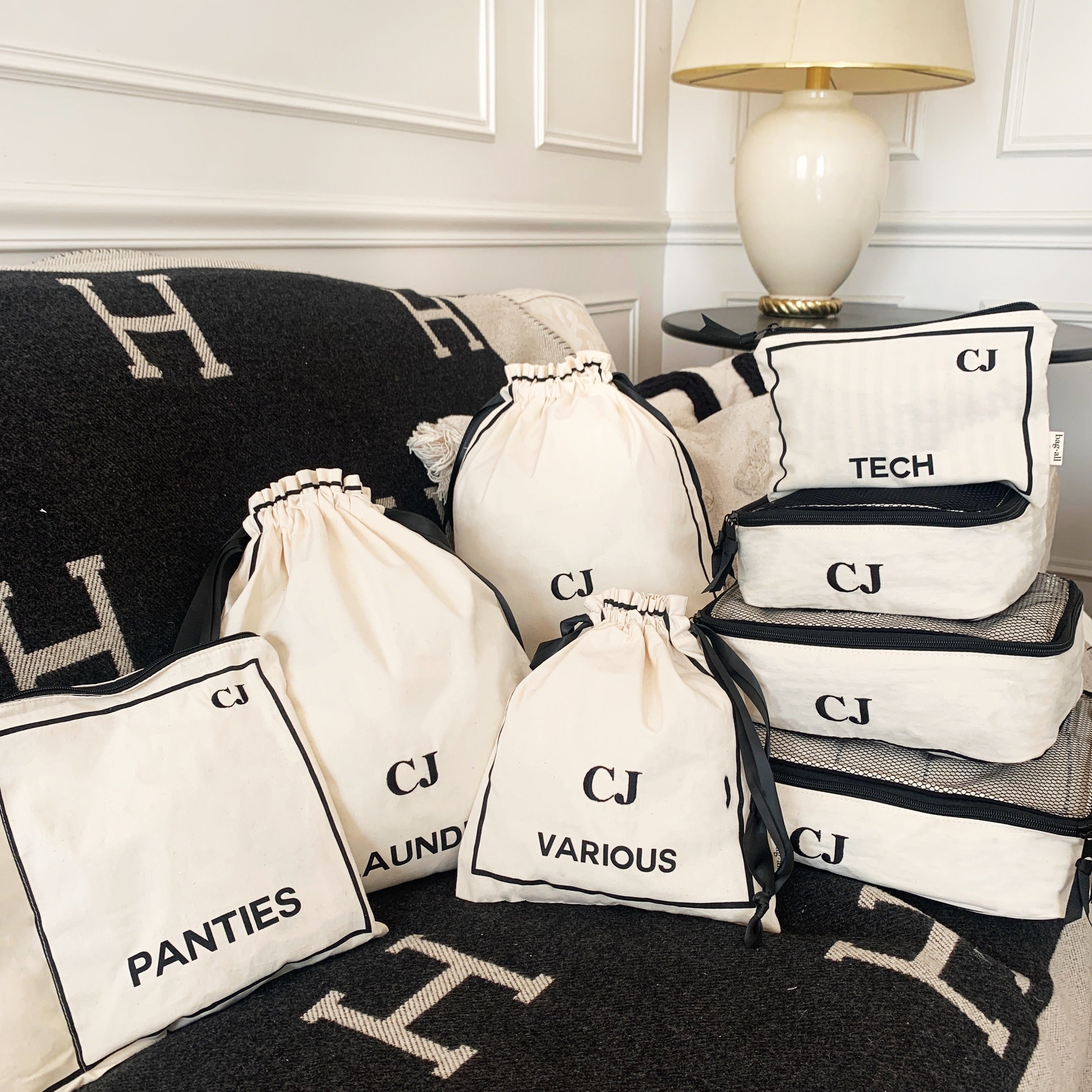 Bag-all BA Travel Set, 8-Pack in Cream with personalized monogram โCJโ. Includes packing cubes, shoe, laundry, tech, and various bags