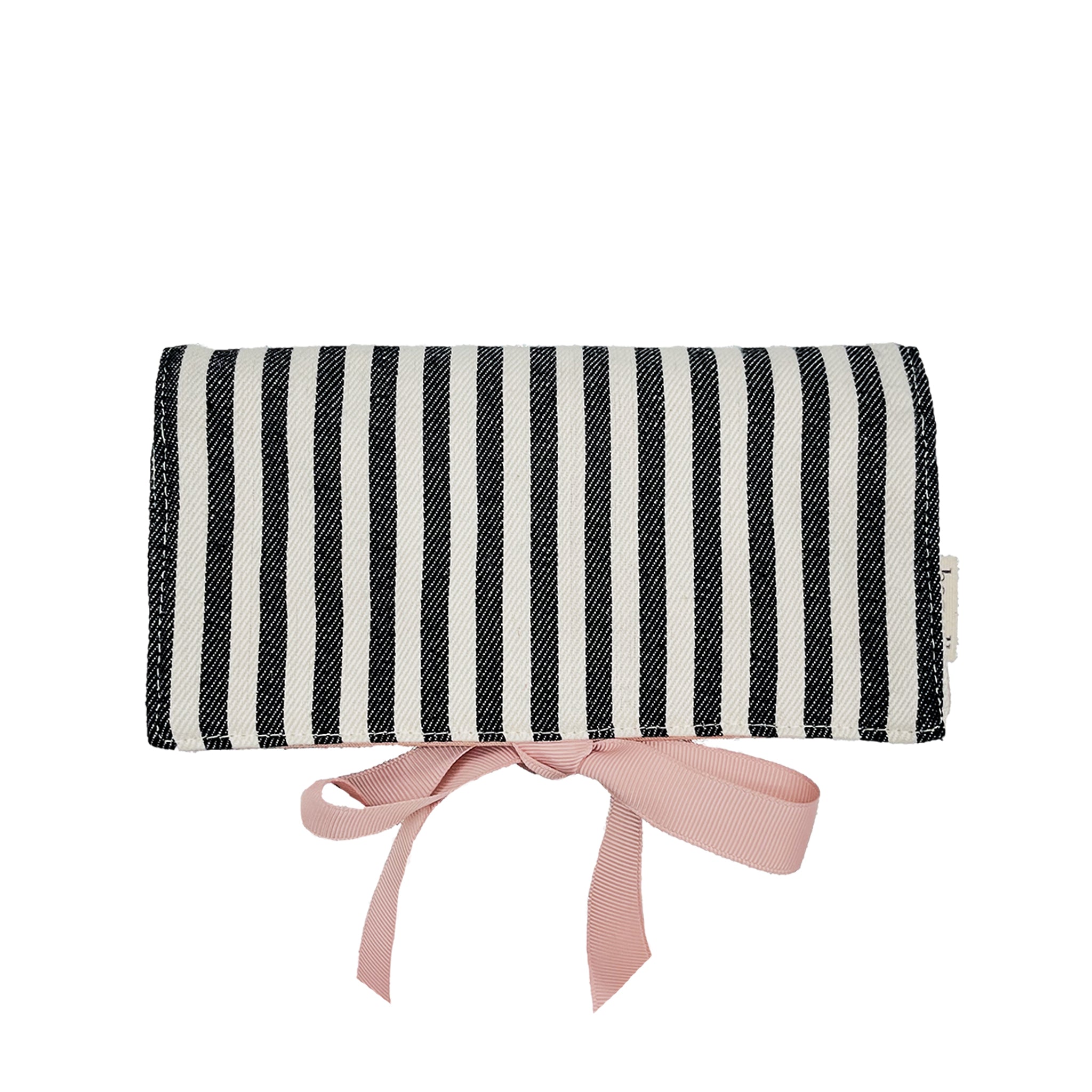 Bag-all Couture Jewelry Roll Medium in black and white stripes with pink bow, featuring three compartments, leather earring holder and ring storage for organized travel