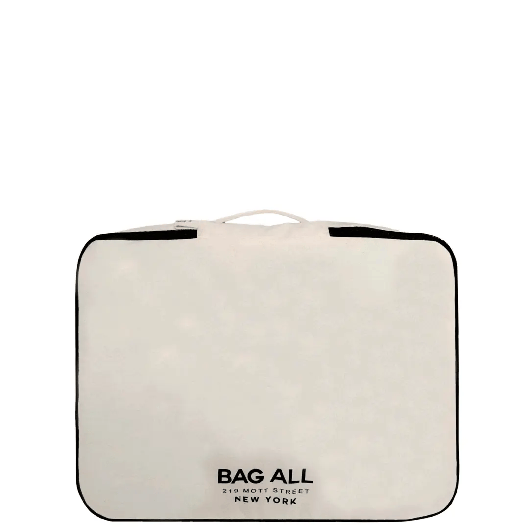 Bag-all Large Packing Cube in cream with double-sided compartments and black trim, featuring logo and extra shoe pocket - perfect for organized travel and storage