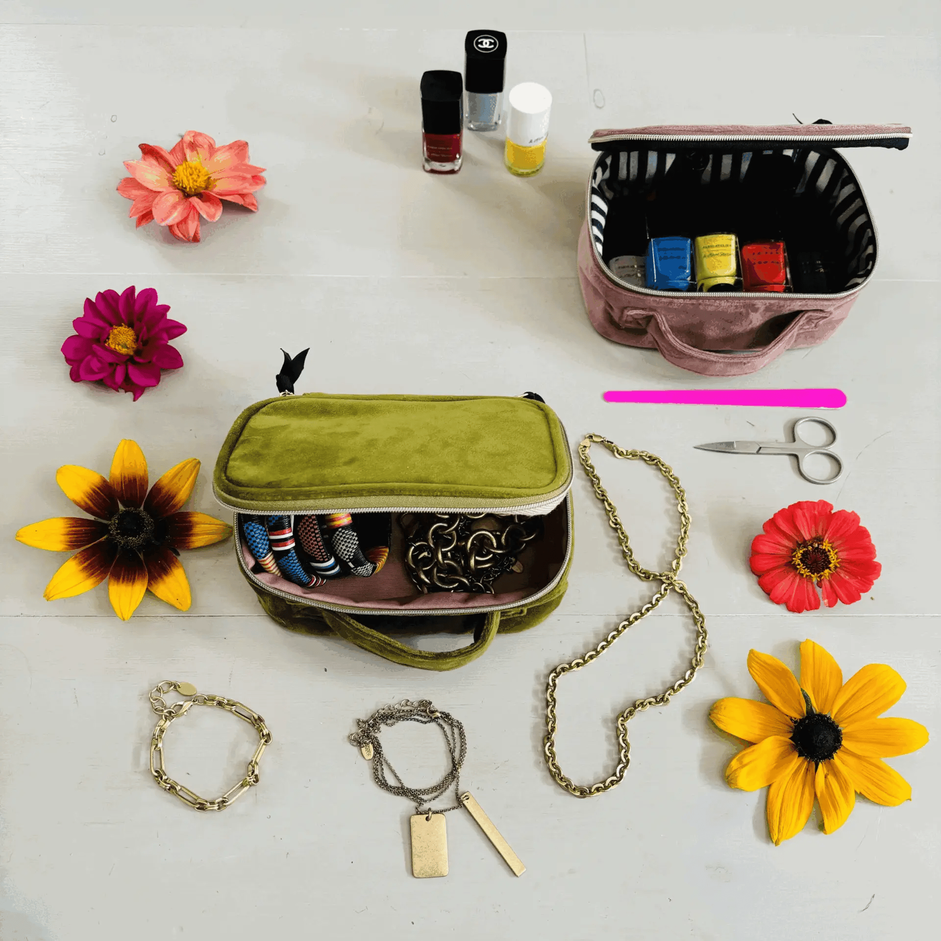 Bag-all Small Beauty Box in green velvet with nail polish, jewelry and floral decor, showcasing organized storage for beauty essentials and accessories