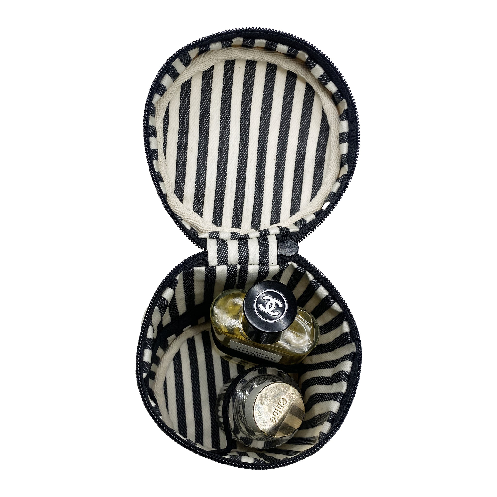 Bag-all Round My Scents Case in pink featuring black and white striped interior, secure rubber bands for perfume bottles, zippered closure, perfect for travel organization