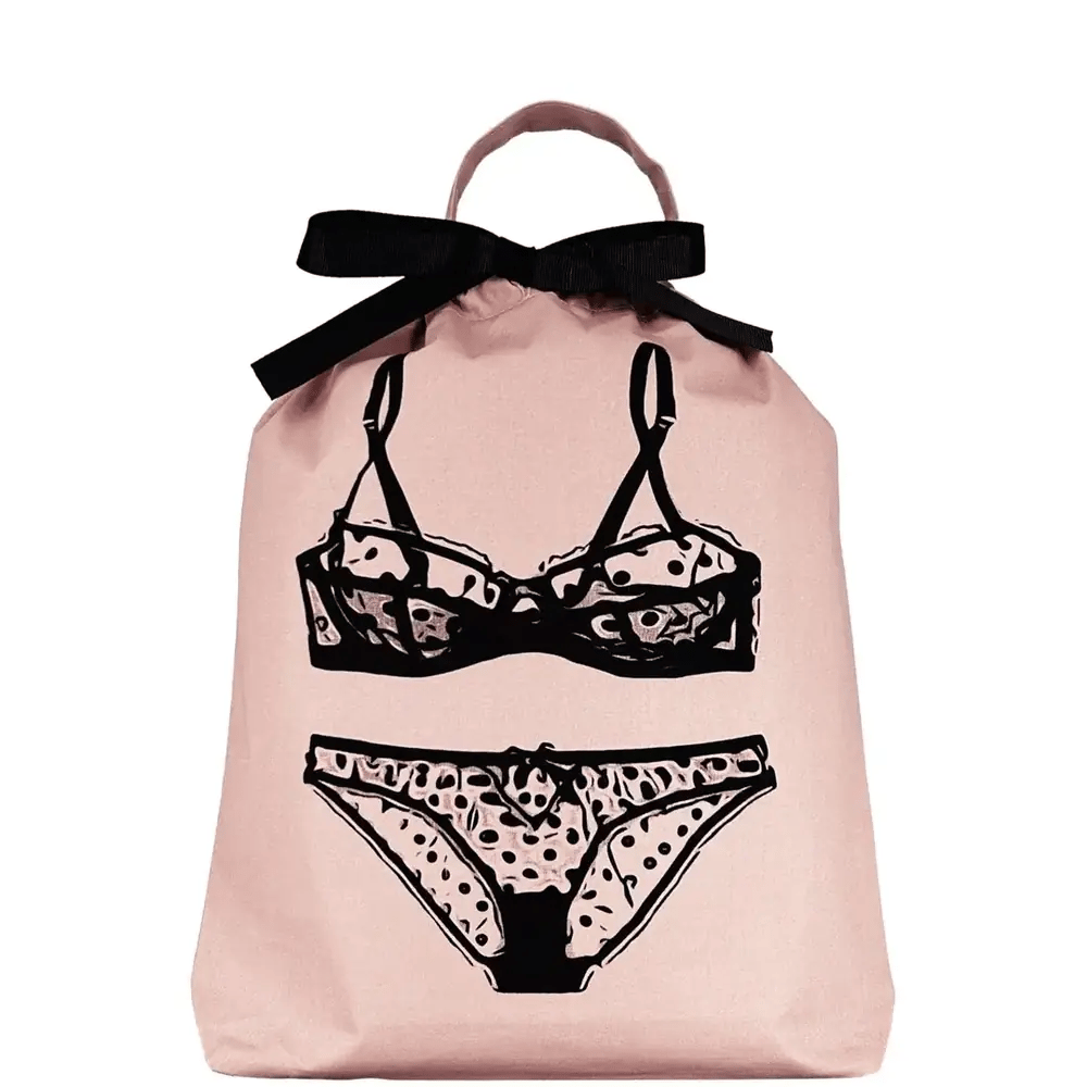 Bag-all Polkadot Lingerie Travel Bag in pink with black lingerie illustration, featuring black bow closure and handle, perfect for organizing delicates and travel