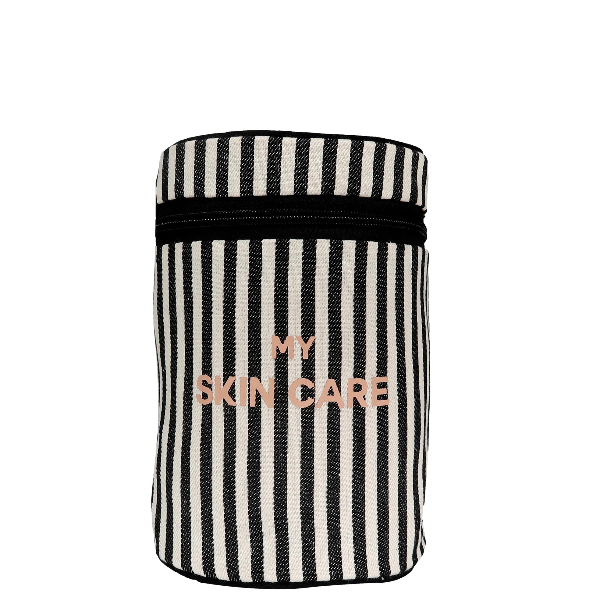 Bag-all Round My Skin Care Case featuring black and white stripes with rose gold lettering, cylindrical organizer with zipper for beauty products