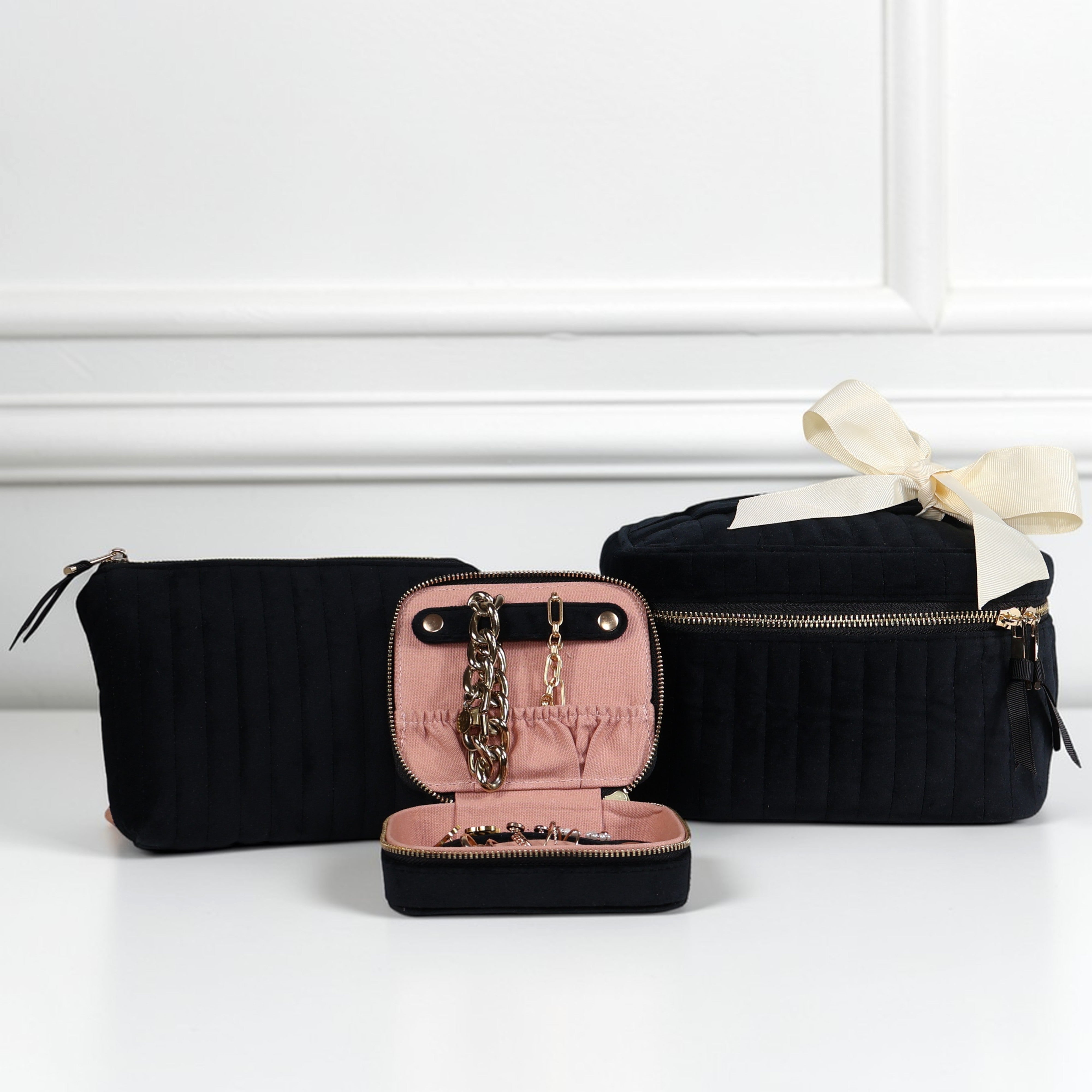 Bag-all eco-velvet black 3-piece makeup and jewelry gift set with gold zipper and pink interior, gallery position one