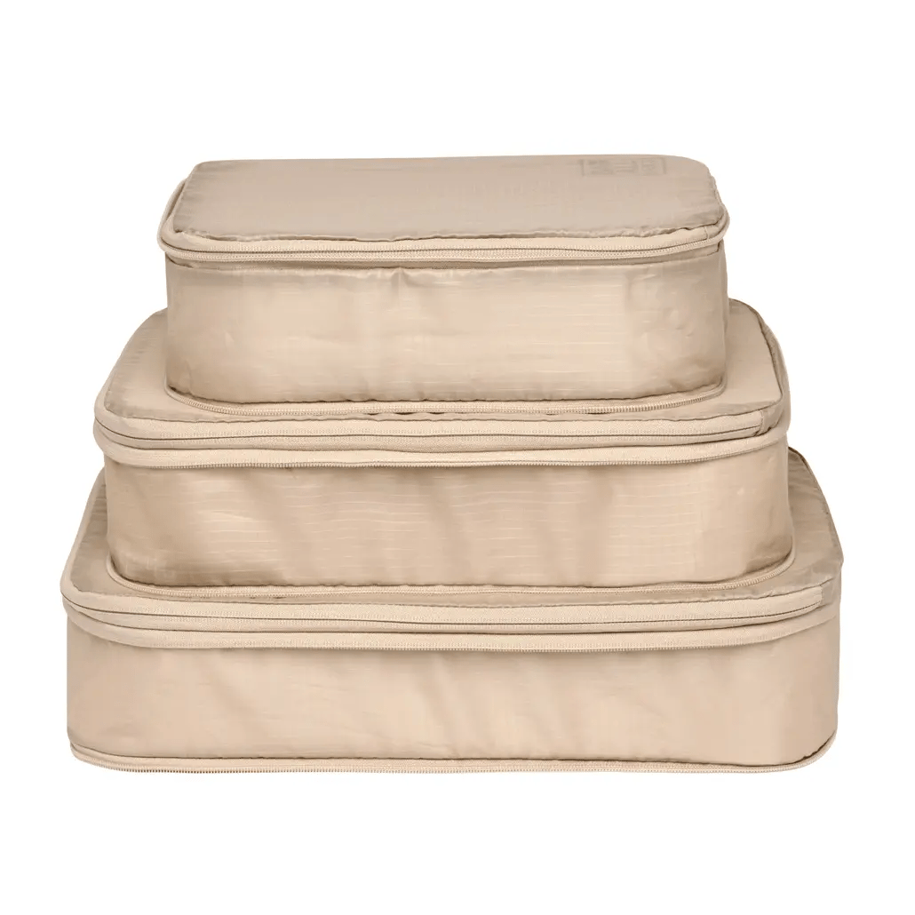 Bag-all Compression Cubes & Packing Bags Set in taupe, featuring 3 stackable nylon cubes in varying sizes for efficient travel organization and space-saving storage