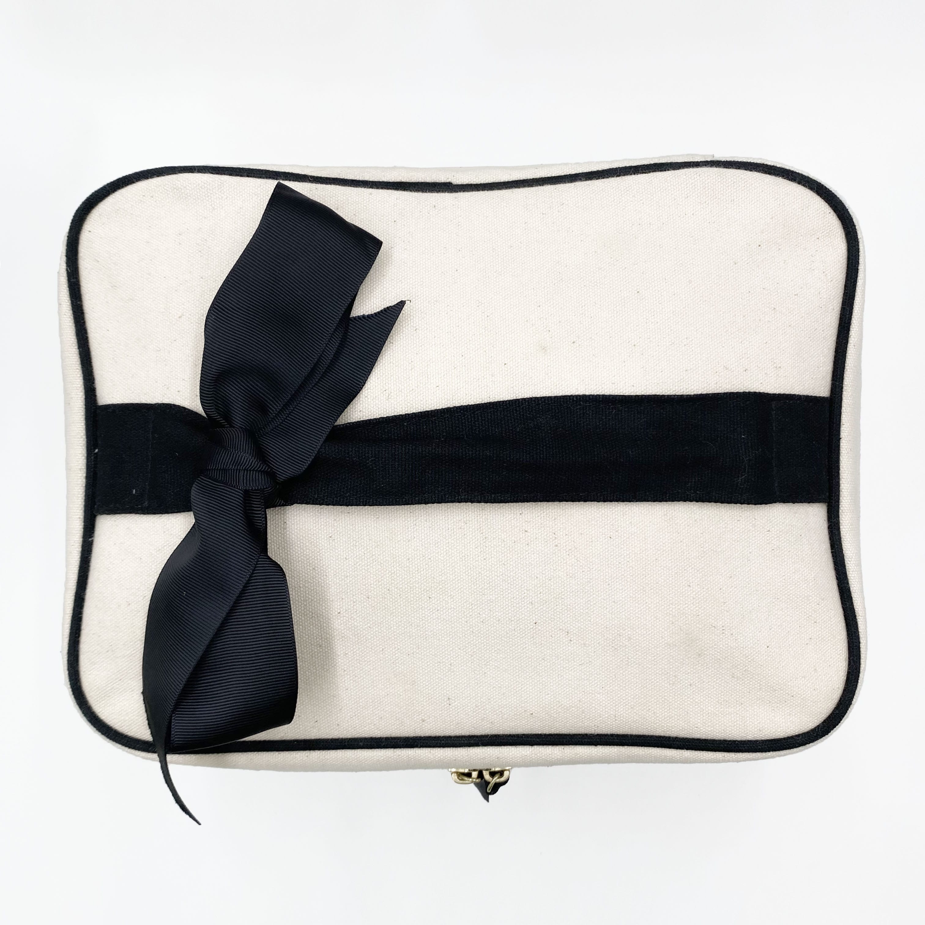 Bag-all My Vanity Large Beauty Box in cream with black trim and black ribbon bow on white background