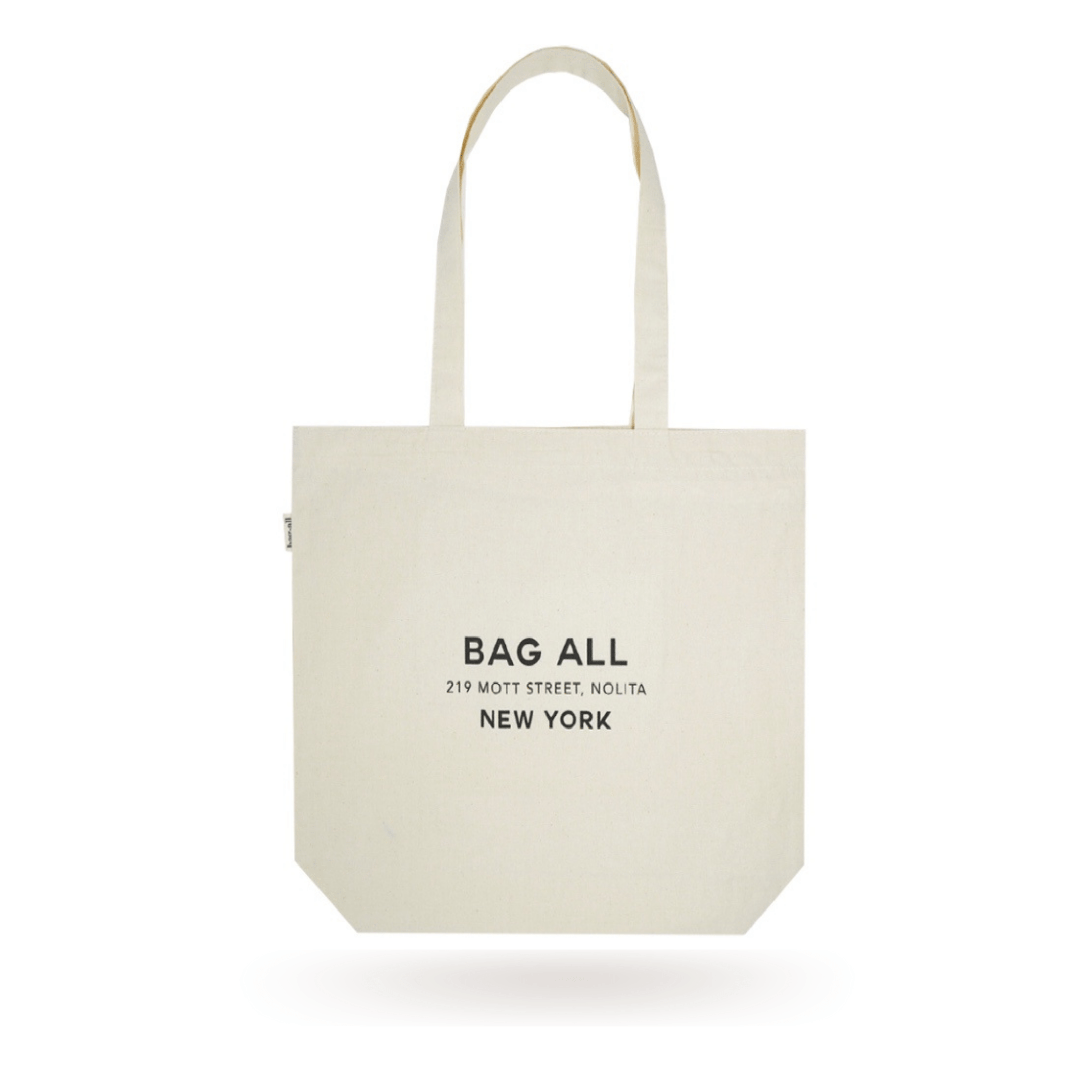 Bag-all New York City Tote - cream cotton zippered tote bag with interior pocket, featuring Bag-all logo and Nolita address, perfect for everyday use