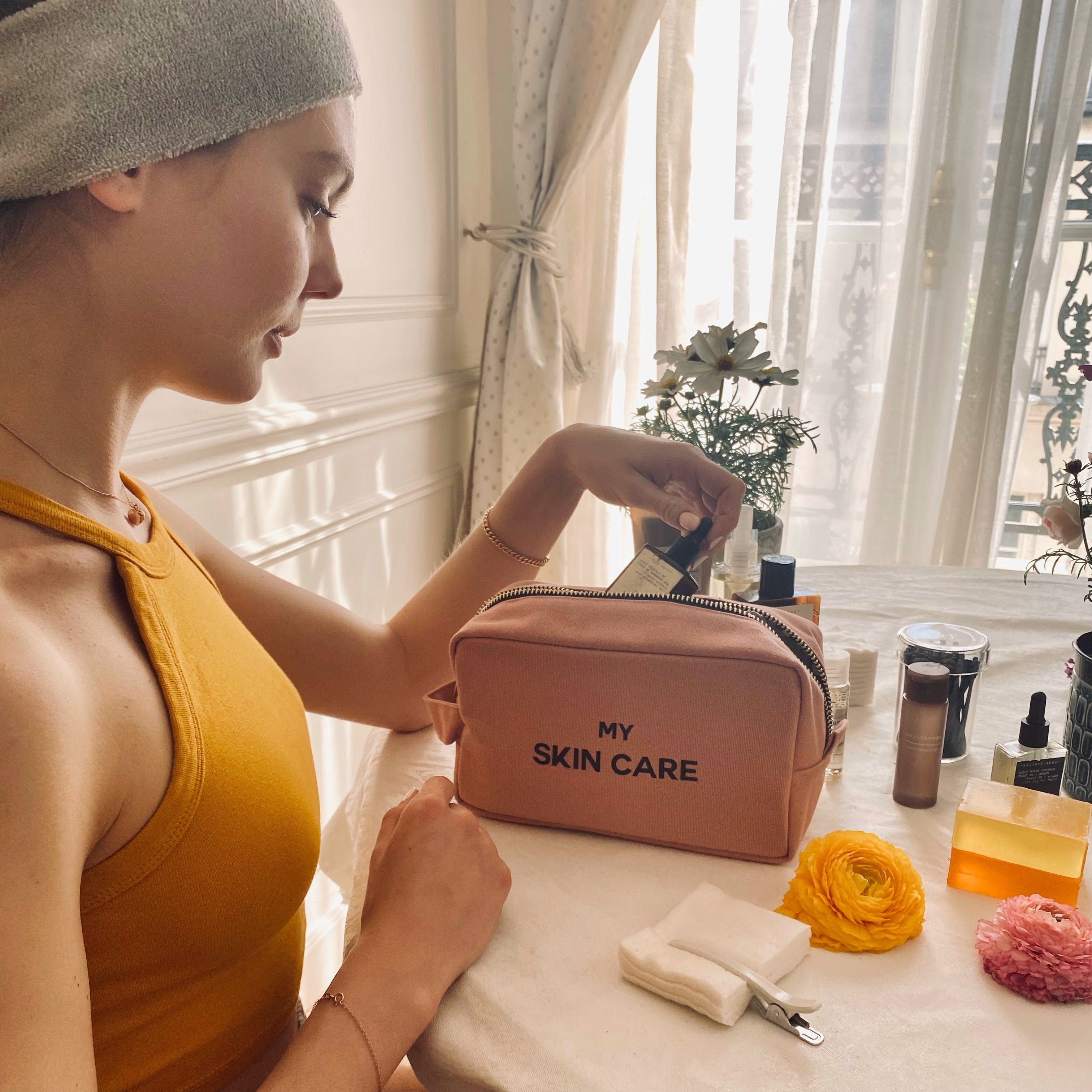 Bag-all My Skin Care Organizing Pouch in pink blush, made of natural cotton with waterproof lining, perfect for storing and organizing skincare products at home or while traveling