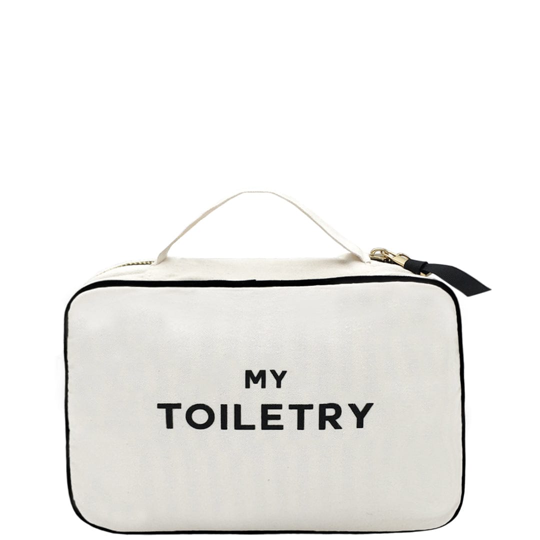 Bag-all Folding/Hanging Toiletry Case in cream with 'My Toiletry' text, featuring three compartments, zippered closure, handle, and hanging ribbon for convenient bathroom organization