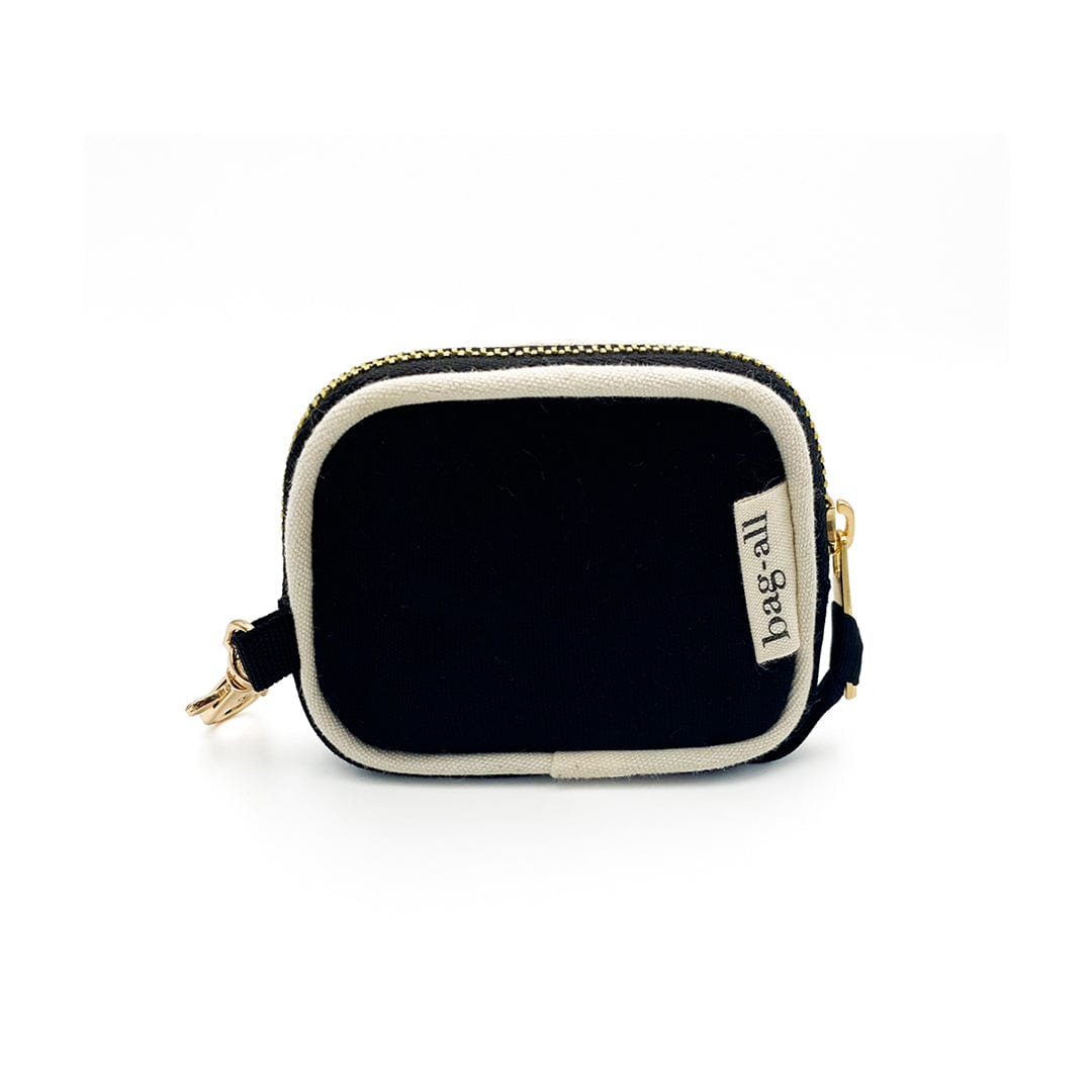 Bag-all Mini Earbud Case in black cotton with white piping, gold zipper and clasp. Compact protective storage for Airpods and earbuds.