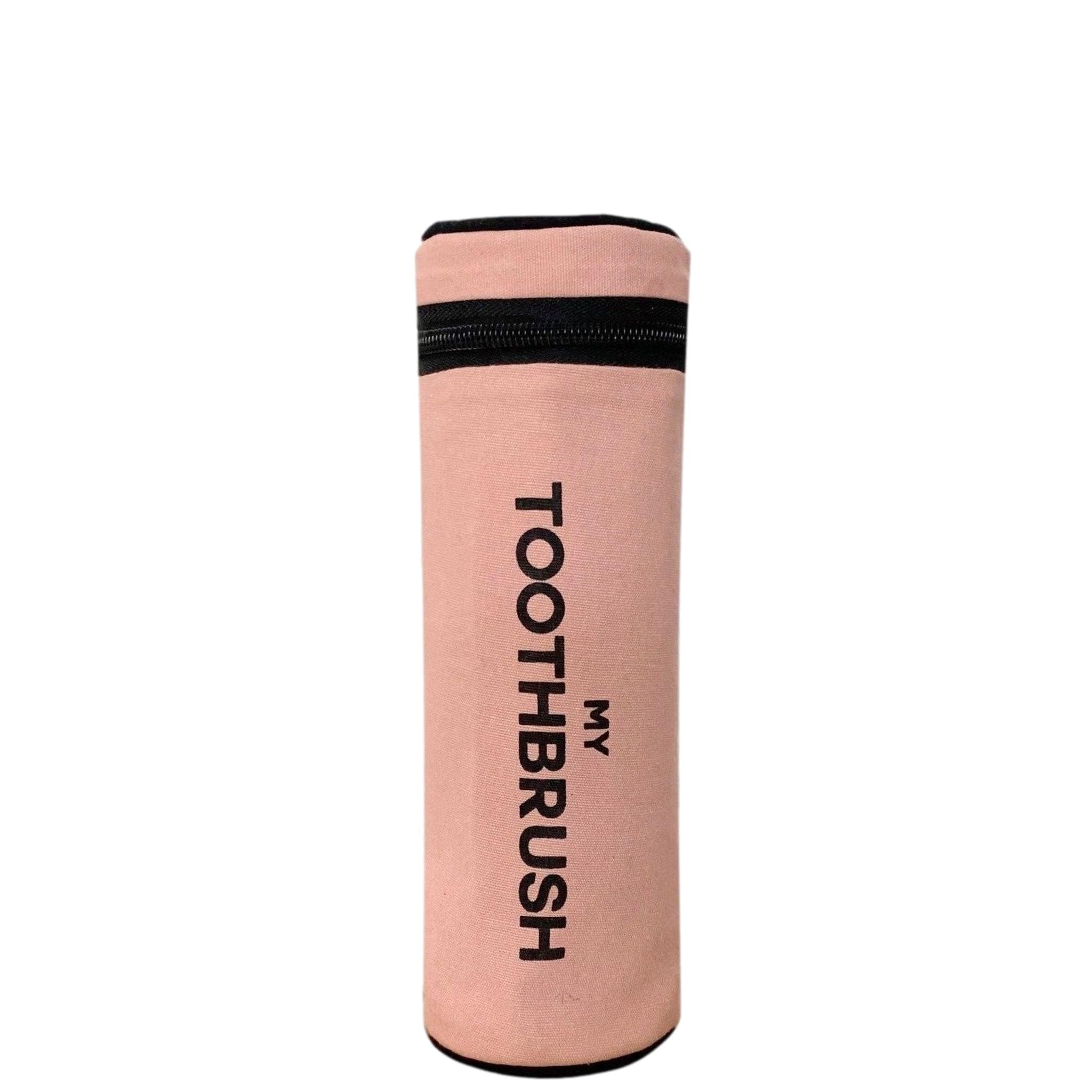 Bag-all Pink Toothbrush Travel Case - Stylish cylindrical holder in blush pink with black zipper and text, fits multiple toothbrushes and toothpaste, perfect for travel organization