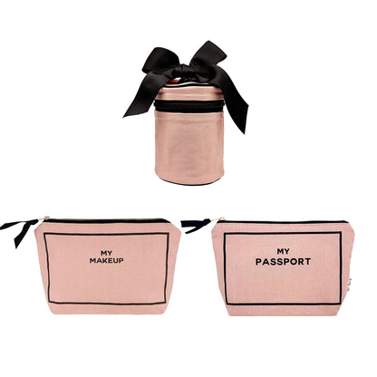Bag-all pink blush 3-pack travel organizers including makeup, passport, and liquid bags with black ribbon detail