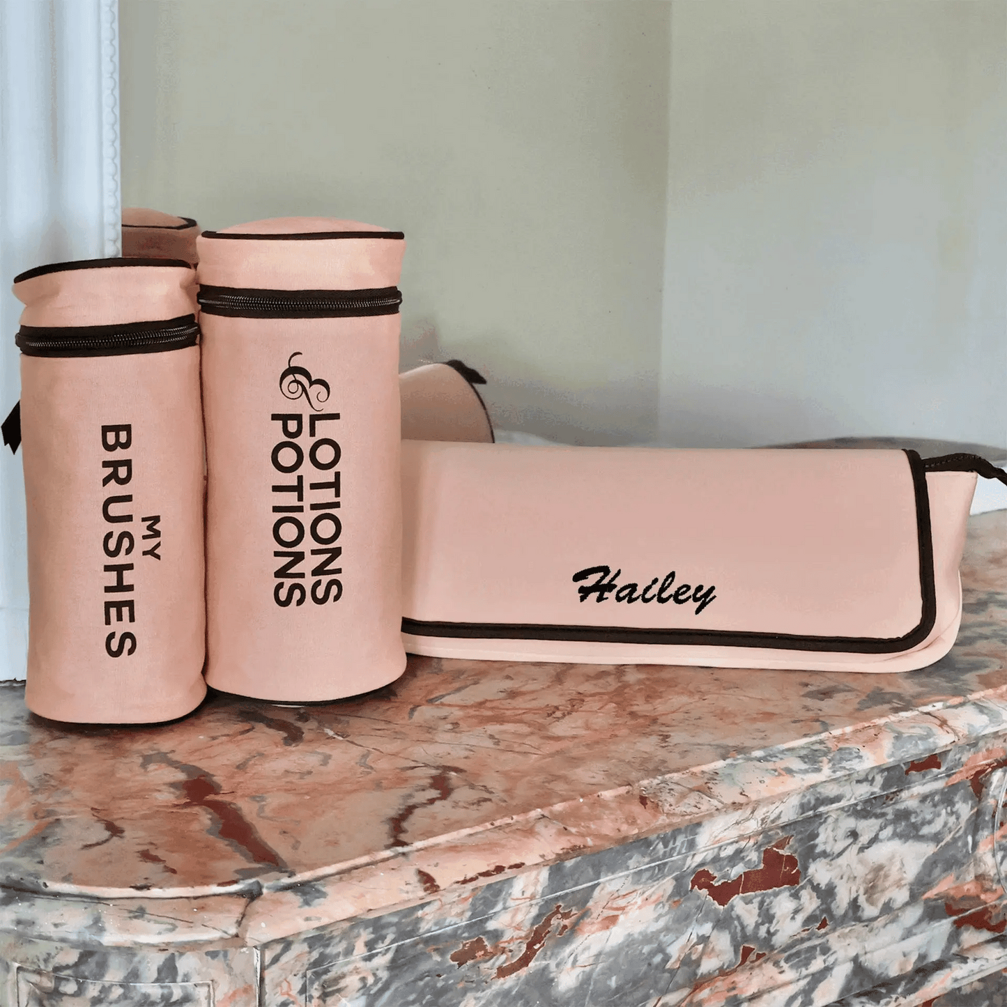 Pink blush 3-pack hair brush and tool organizer set with personalized name by Bag-all on marble surface