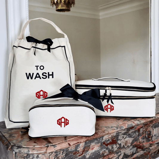 Bag-all Weekender Gift Set 3-Pack laundry and beauty cases in cream with black accents on marble surface