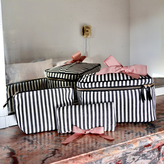Bag-all striped 3-pack travel and makeup organizers with pink bows, stylish and functional for everyday use.
