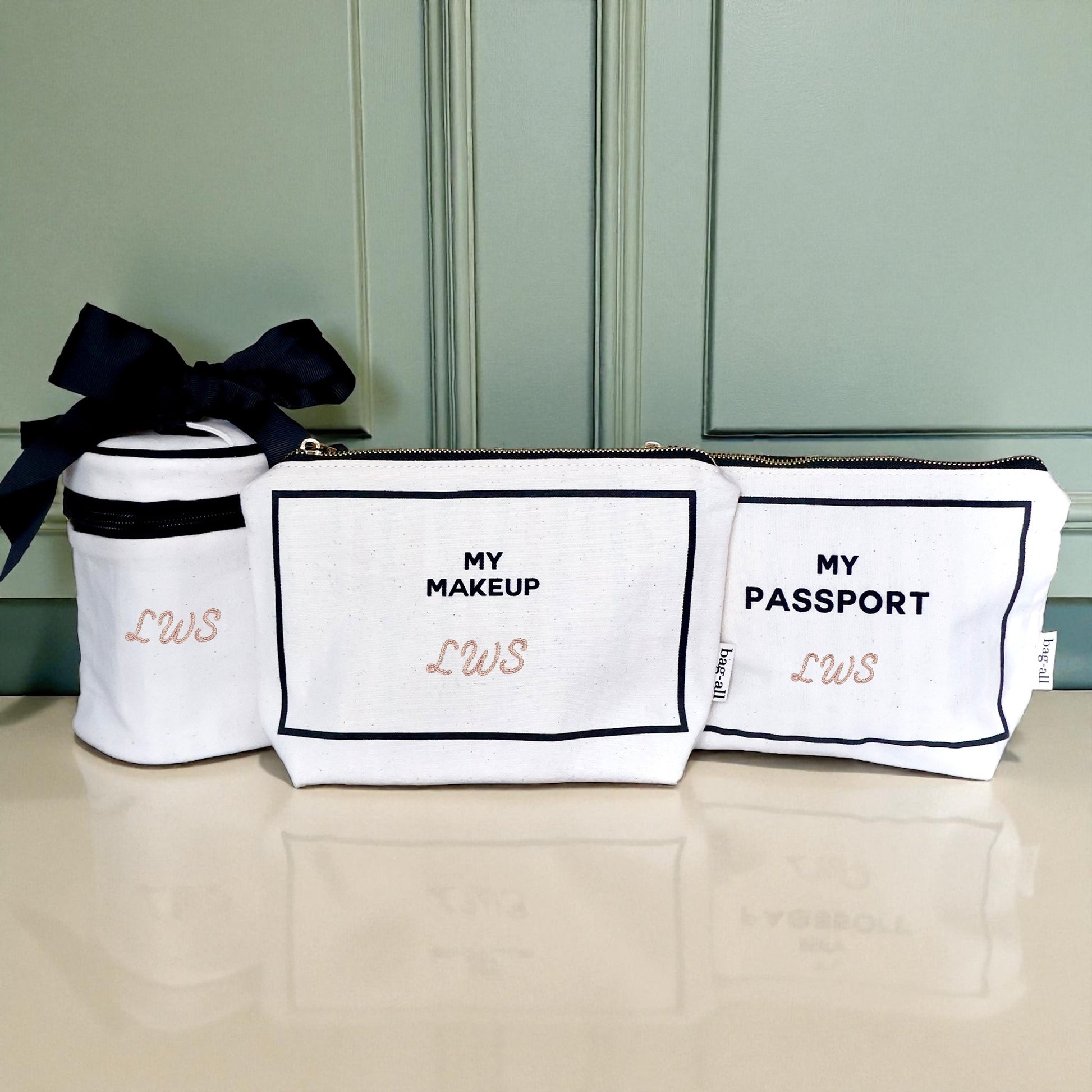 Bag-all Carry On Essentials Deal 3-pack organizer set with passport, liquid, and makeup bags in cream color