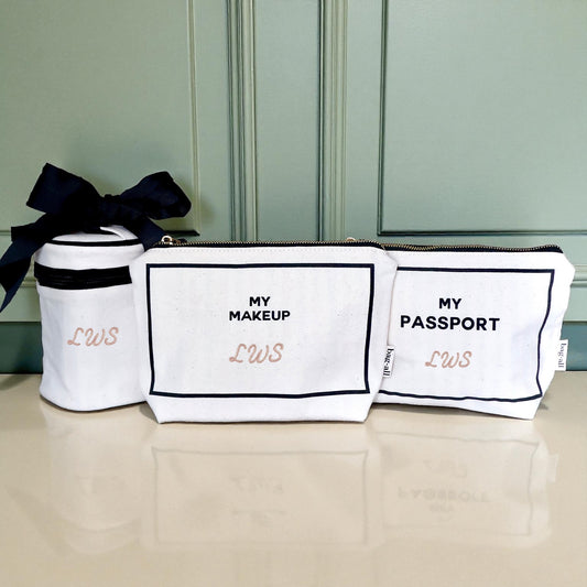 Bag-all Carry On Essentials Deal 3-pack organizer set with passport, liquid, and makeup bags in cream color