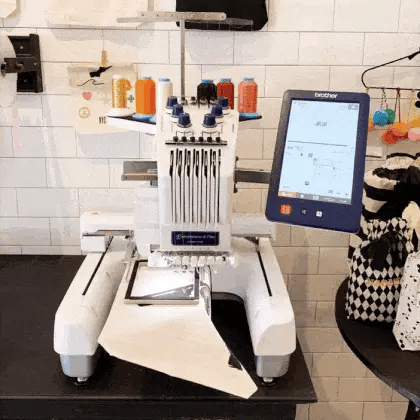 Bag-all professional embroidery machine setup for custom monogramming with digital display and multicolor thread selection - MONOGRAM DO NOT REMOVE product customization station