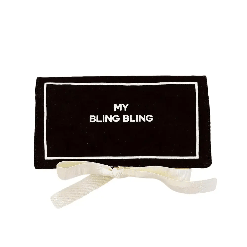 Black Bag-all jewelry travel pouch with white text and cream ribbon tie on white background