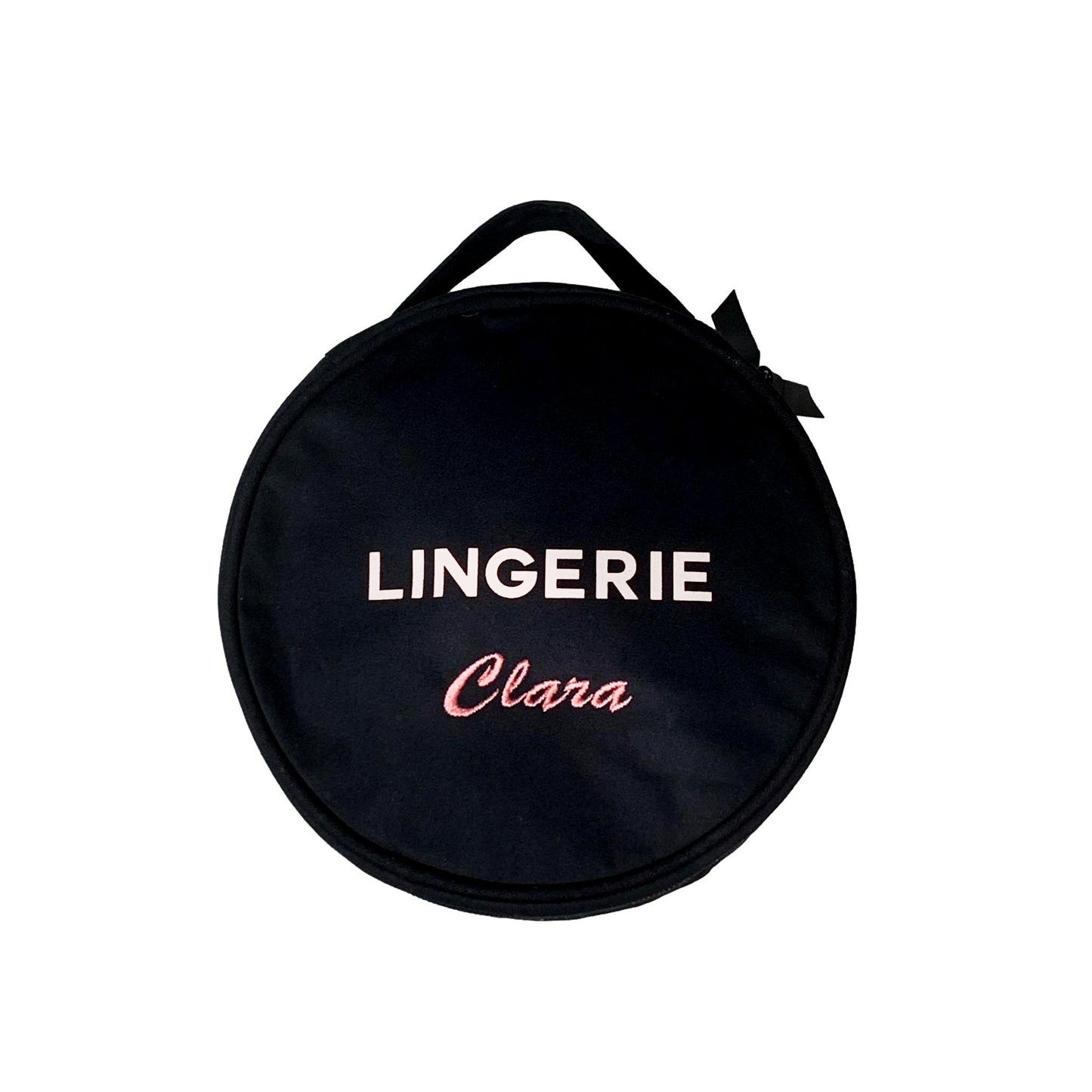 Black round Bag-all lingerie case with handle and pink "LINGERIE Clara" embroidery on white background