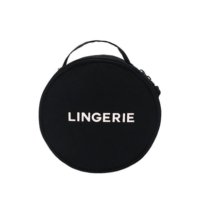 Black circular lingerie case with zipper and handle, white "LINGERIE" text, Bag-all travel organizer bag