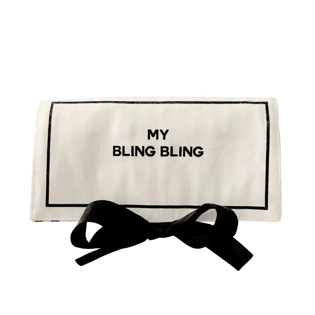 Bag-all cream jewelry organizer travel pouch with black tie closure and My Bling Bling text on white background