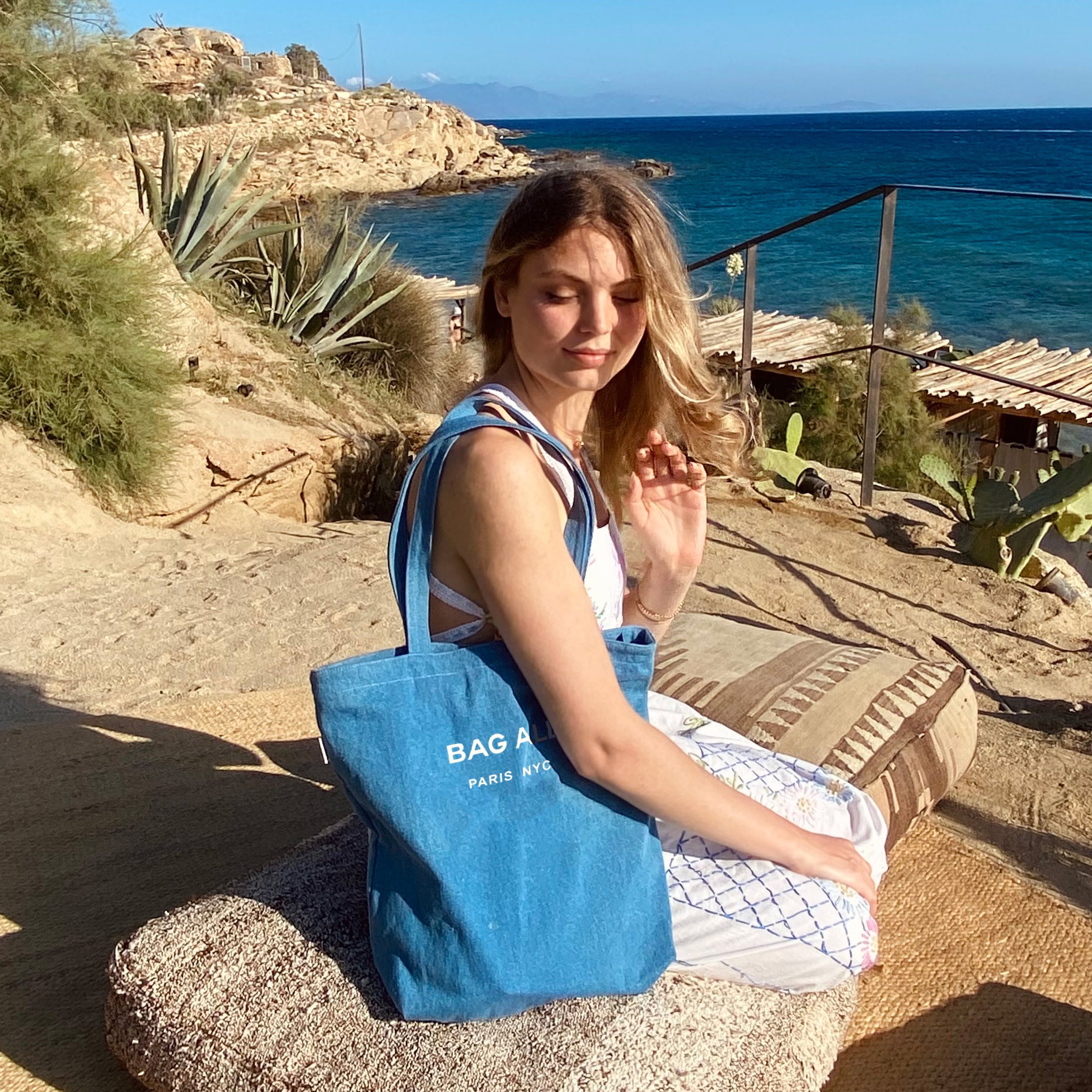 Bag-all durable denim tote with zipper and inside pocket perfect for daily use and beach trips on sunny outdoor adventure