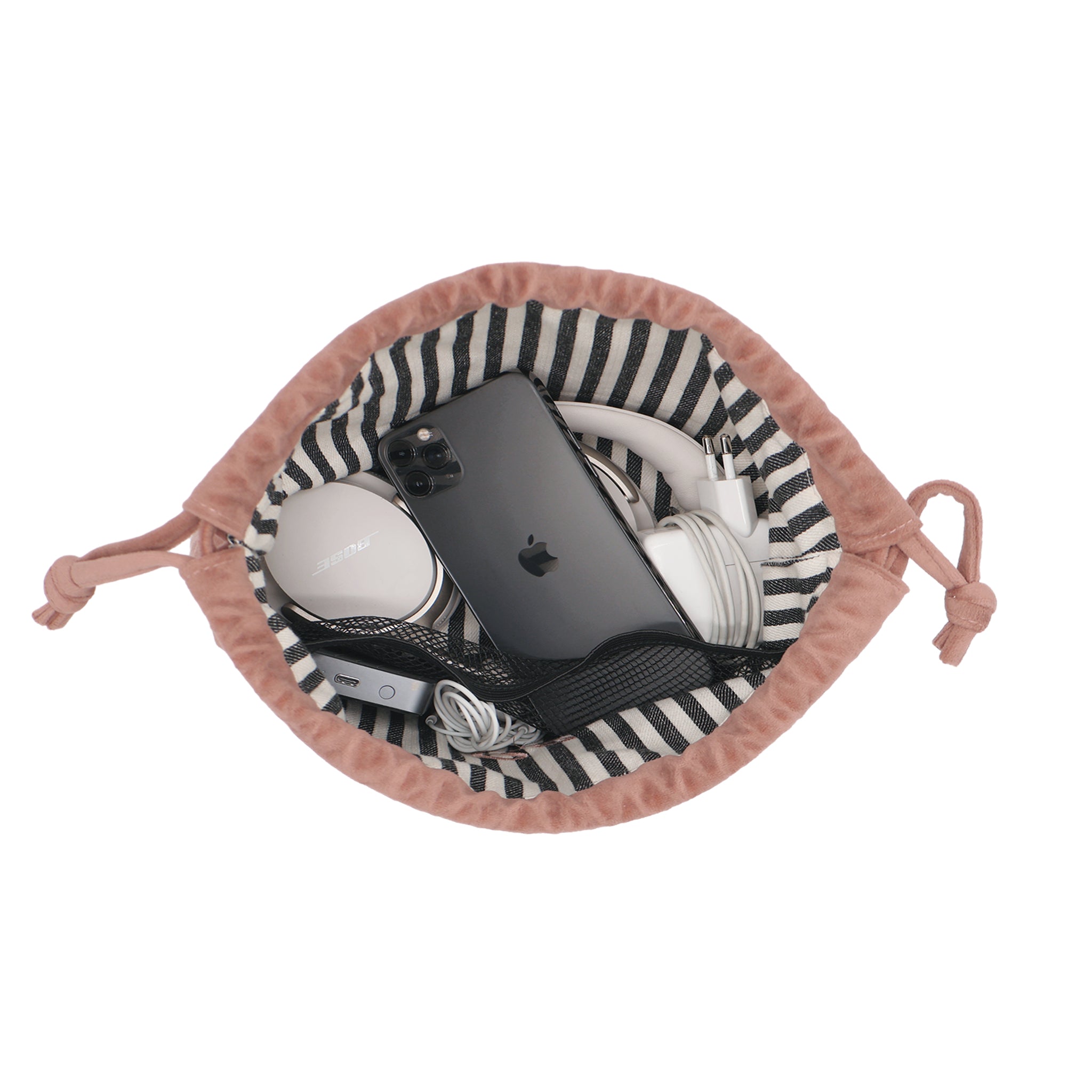Pink velvet drawstring tech pouch by Bag-all holding phone, headphones, charger, and cables with striped interior lining