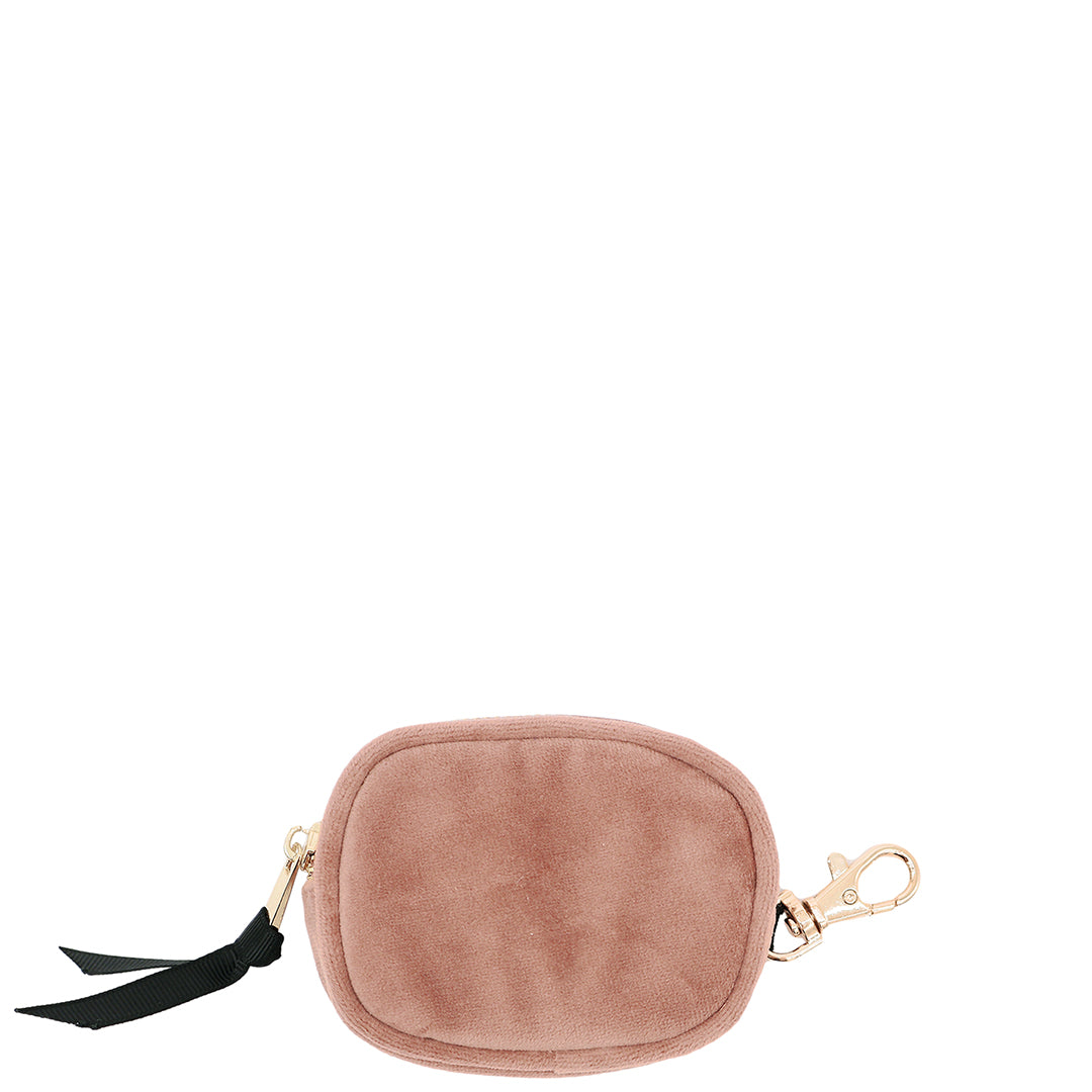 Pink velvet Bag-all earbuds case with gold zipper and clasp on white background isolated minimalist style