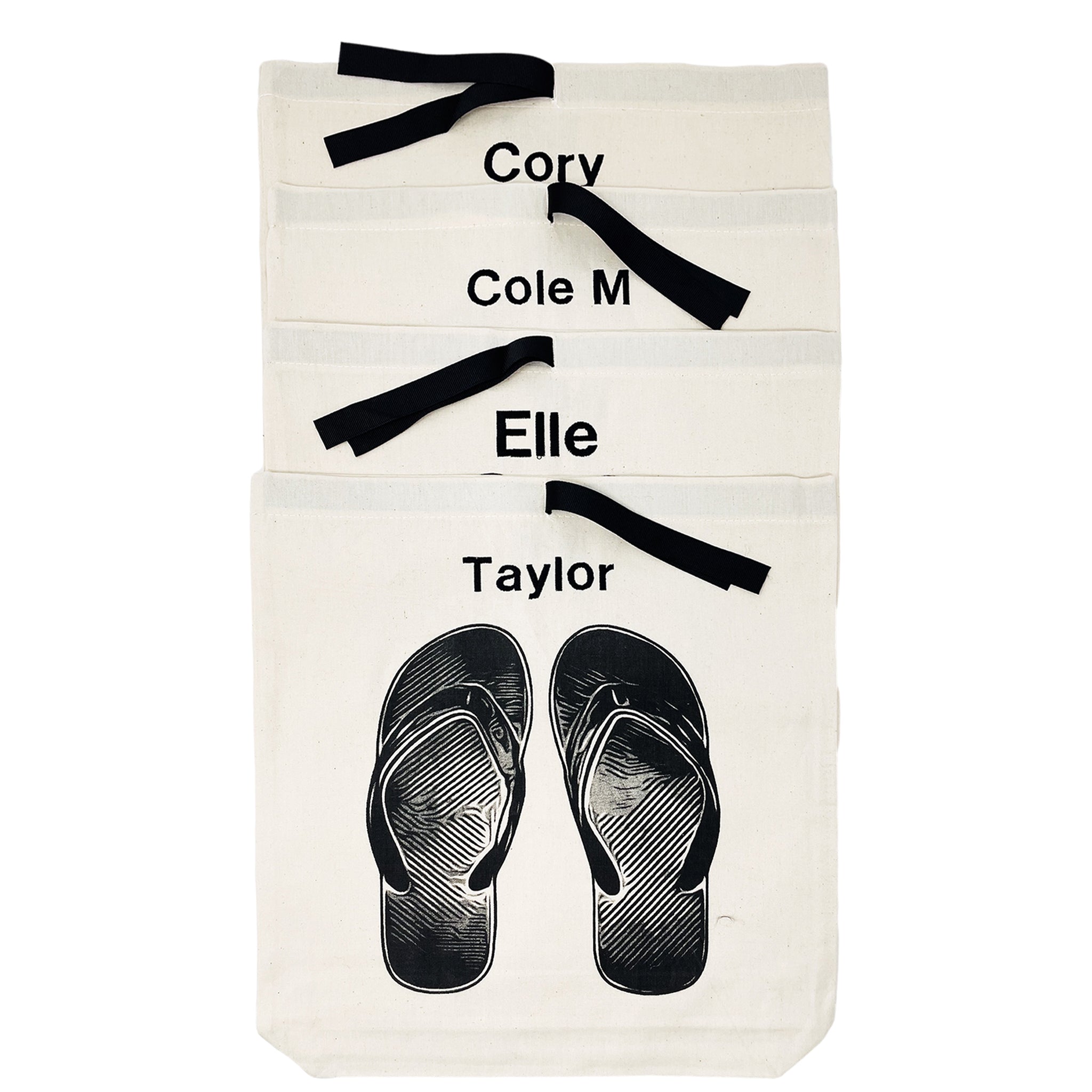 Bag-all Flip Flops Shoe Bag in cream canvas with black flip flop graphic and personalized name labels, featuring contrasting black ribbon ties for organized summer storage