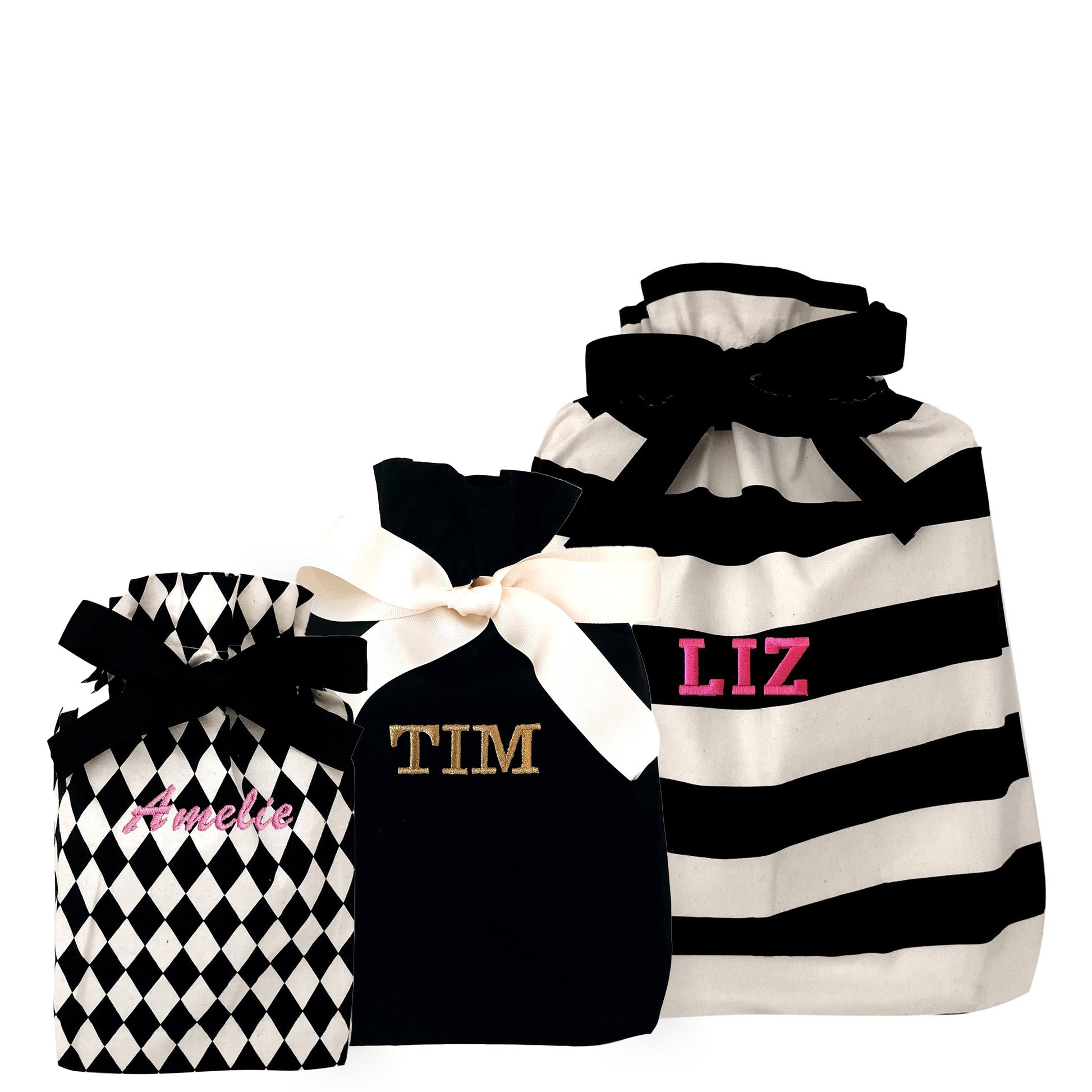 Bag-all Gift Bags Set Mix 1: Black and white patterned reusable fabric gift bags featuring diamond, solid, and striped designs with personalized monogram options and elegant ribbon ties