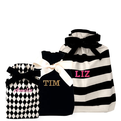 Bag-all Gift Bags Set Mix 1: Black and white patterned reusable fabric gift bags featuring diamond, solid, and striped designs with personalized monogram options and elegant ribbon ties