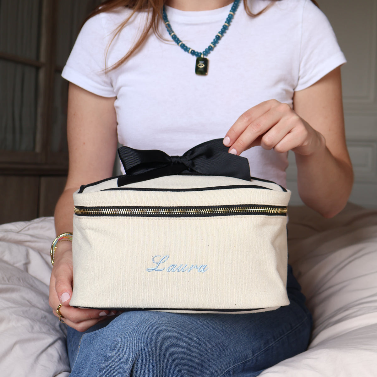 Bag-all Medium Box Makeup & Toiletry with Insert Organizer – Cream, personalized with Laura and finished with a black ribbon and zipper
