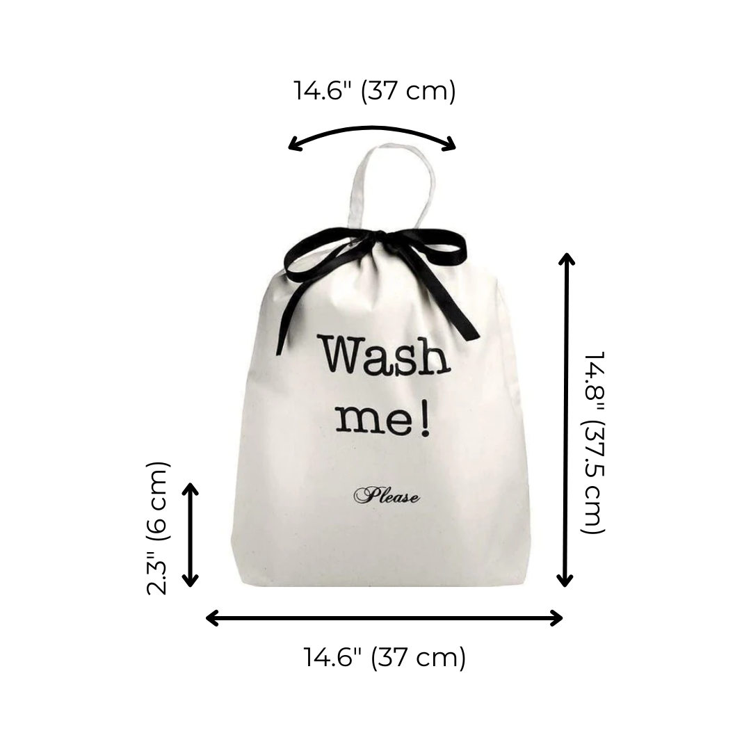 Bag-all cream cotton laundry bag with "Wash me!" text and black ribbon tie, showing dimensions 37x37cm with 6cm handle height