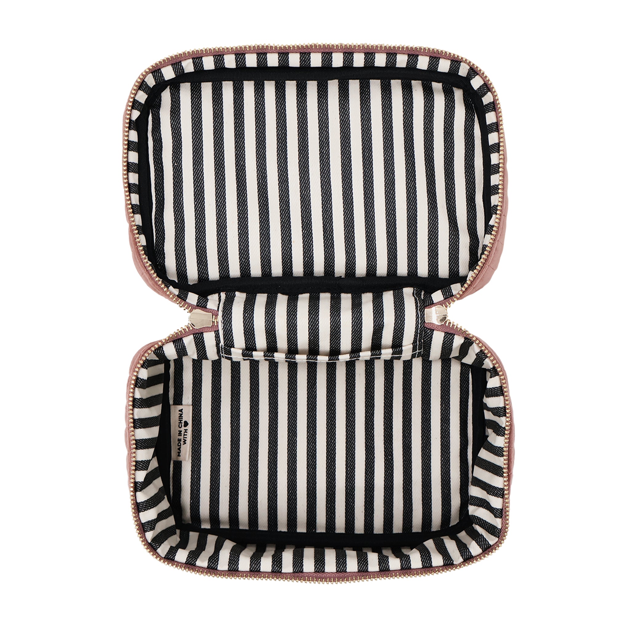 Open quilted pink velvet cosmetic box with black and white striped interior by Bag-all