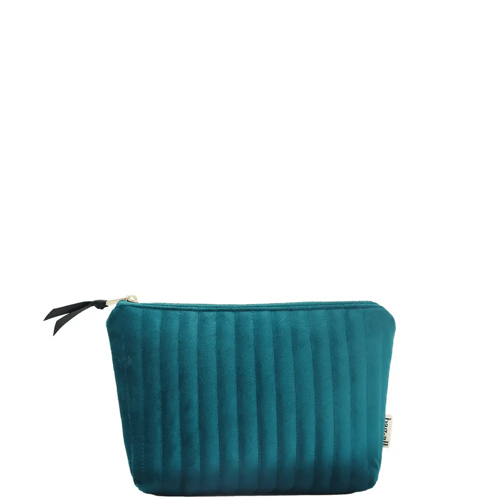 Quilted teal velvet makeup pouch with coated lining, compact and stylish organizer from Bag-all for beauty essentials.