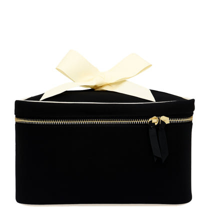 Black Bag-all medium box makeup and toiletry case with gold zipper and cream bow on white background