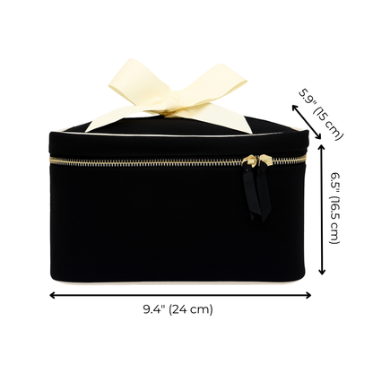 Black Bag-all medium box makeup and toiletry case with gold zipper and cream ribbon on white background