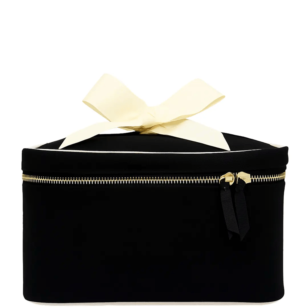 Black Bag-all medium box makeup and toiletry case with gold zipper and cream bow on white background