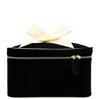 Black Bag-all medium box makeup and toiletry case with gold zipper and cream bow on white background