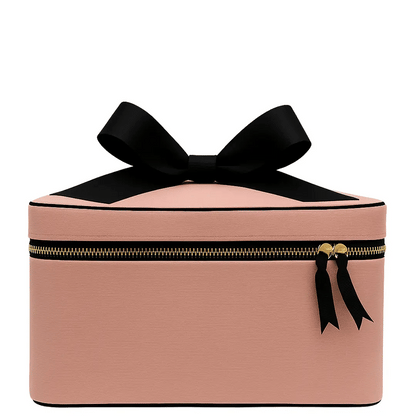 Pink Bag-all medium box makeup and toiletry case with black zipper and bow on white background