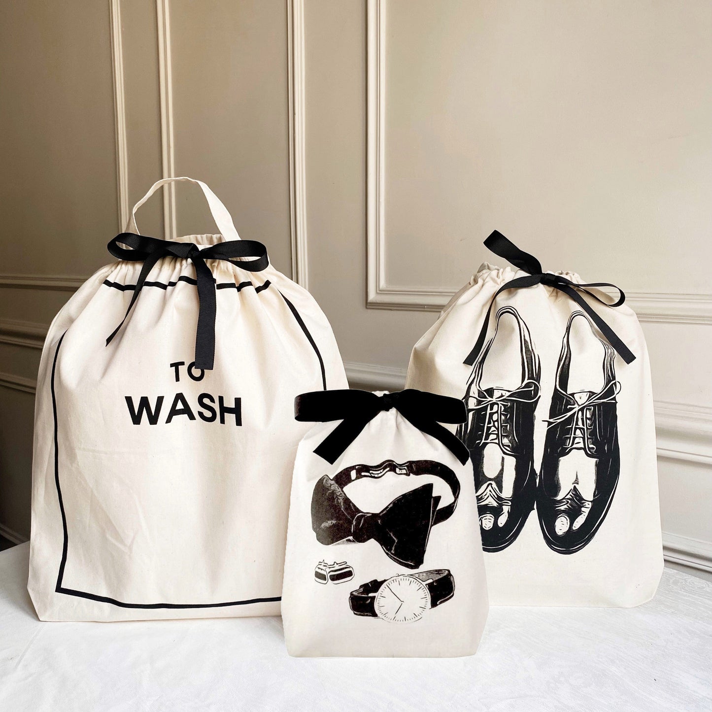 Bag-all Deal Gift Set His Favorites 3-pack featuring white cotton organizer bags with black ribbon - To Wash laundry bag, mens shoe bag, and accessories bag with classic prints